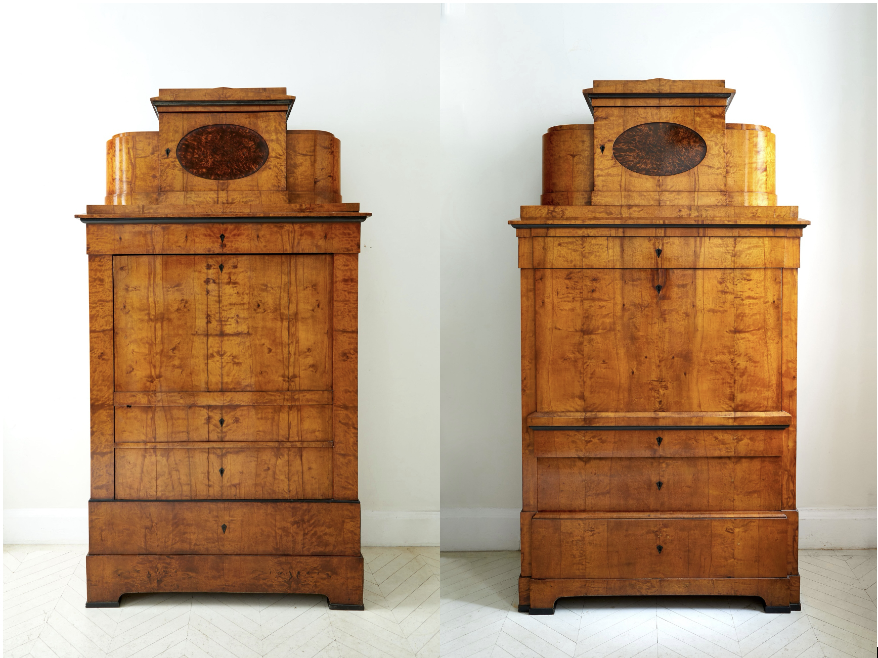 Two German Neoclassical companion pieces; a fall-front secretaire and matching armoire
