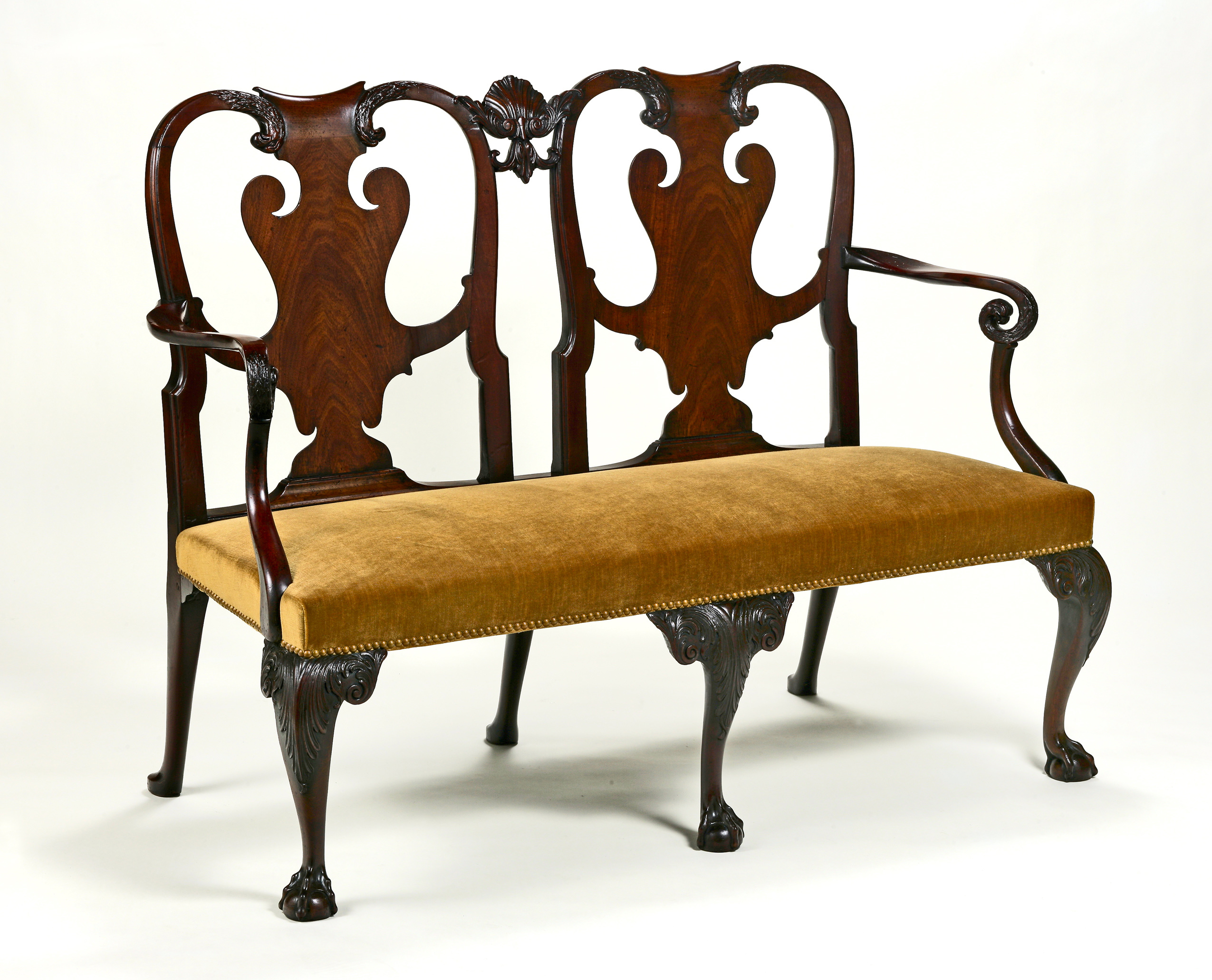 An Irish George II Mahogany Double-Chairback Settee