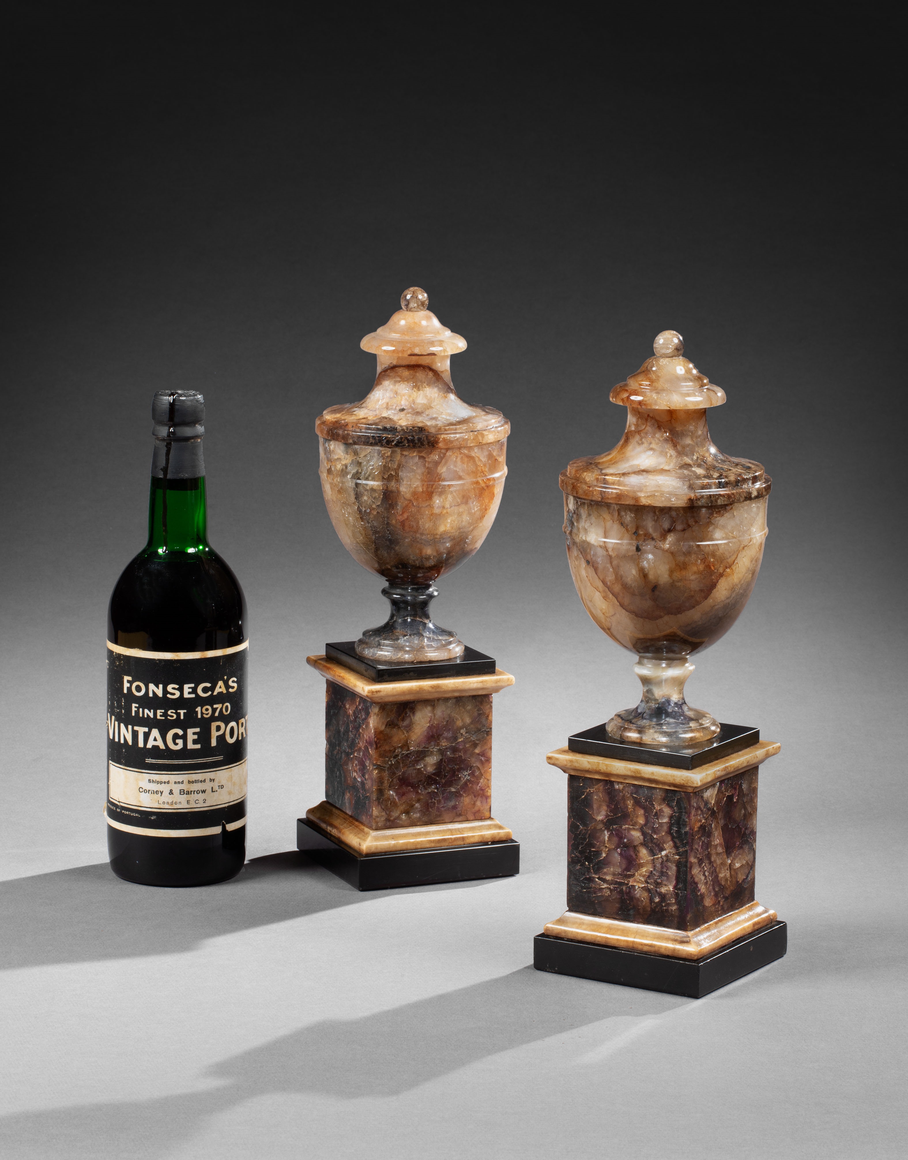 A PAIR OF GEORGE III BLUE JOHN URNS