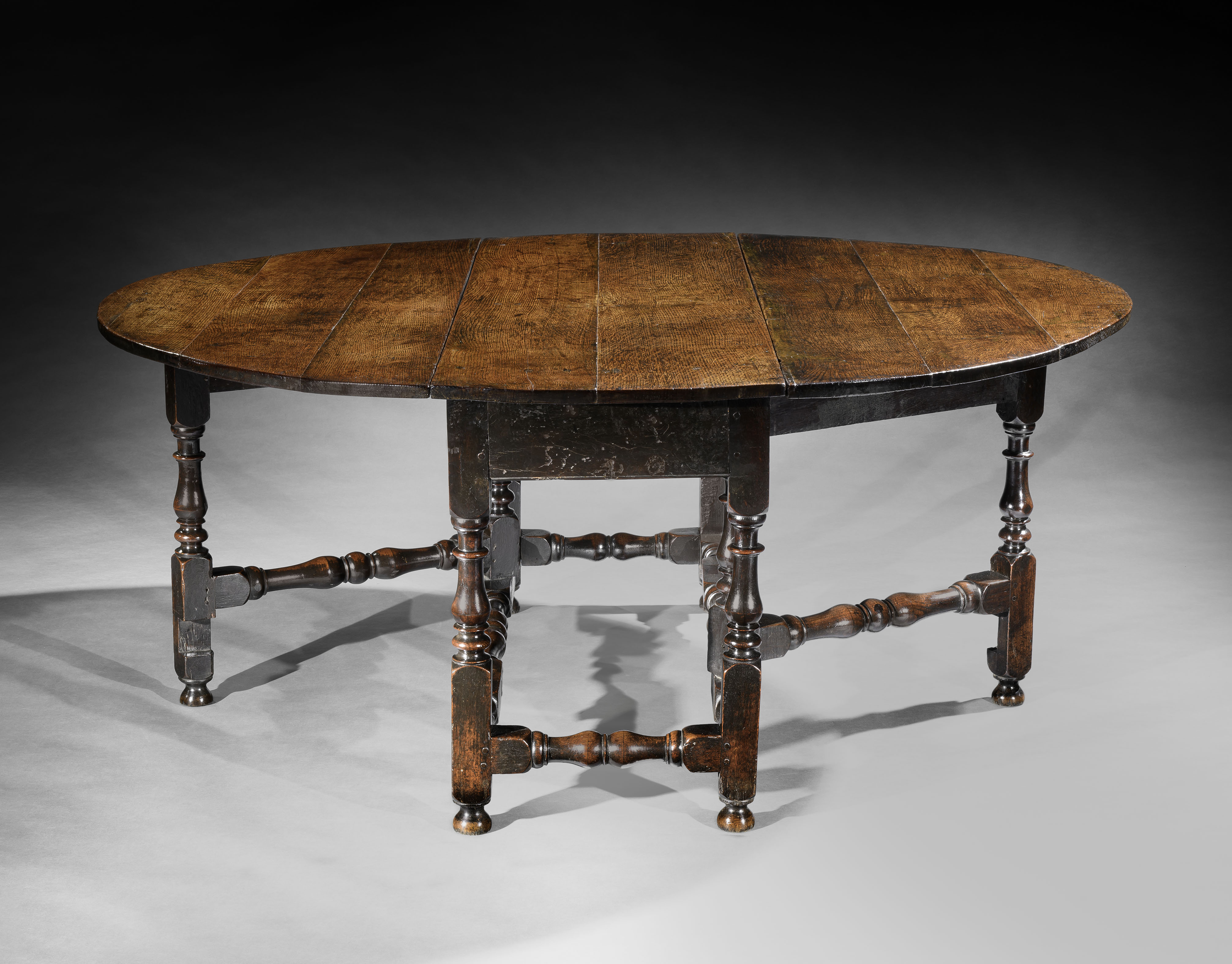 A Handsome Large Charles II Oval Drop Leaf Table