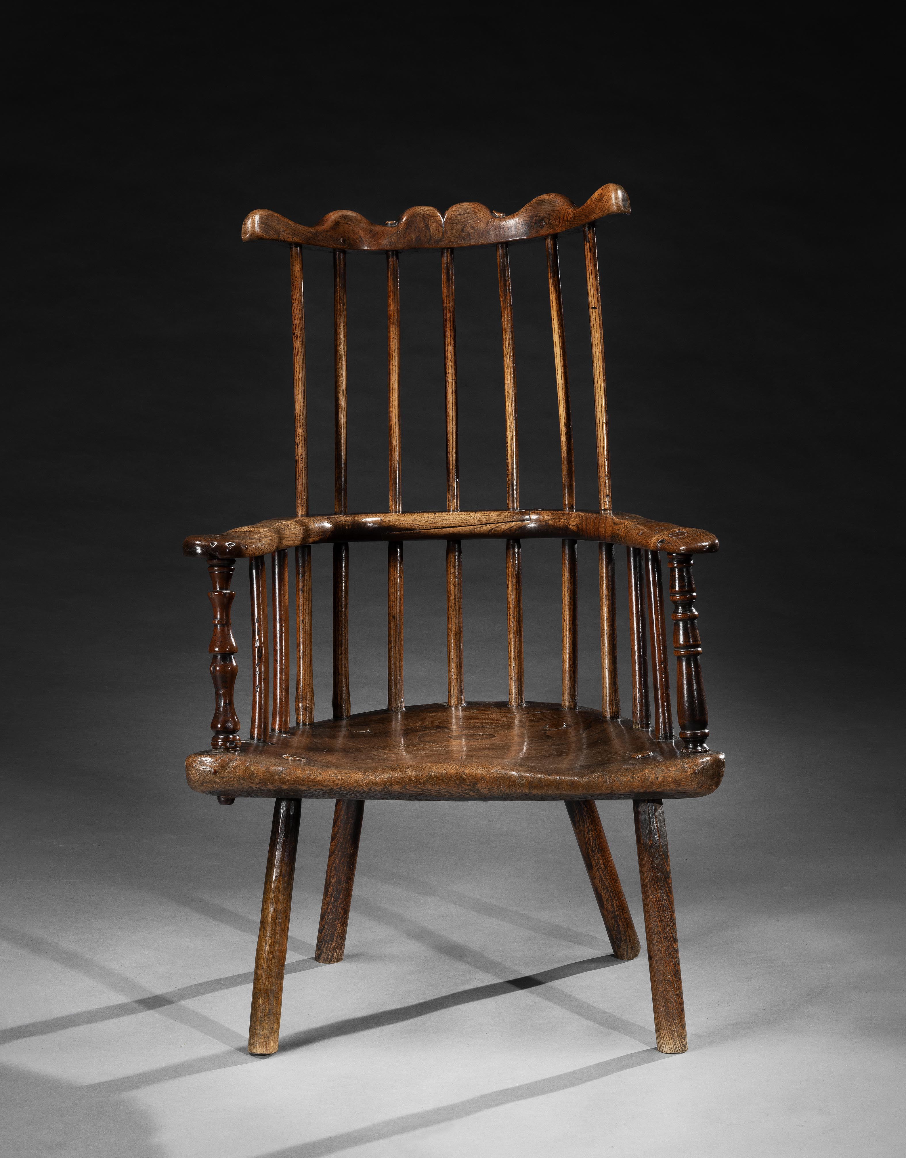 An Exceptional Primitive Comb Back Armchair