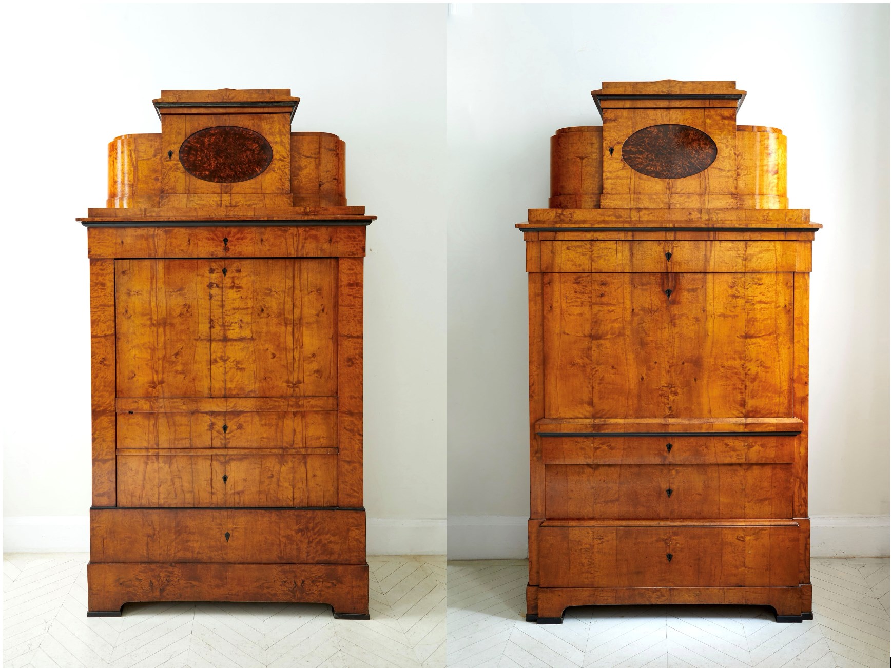 Two German Neoclassical companion pieces; a fall-front secretaire and matching armoire