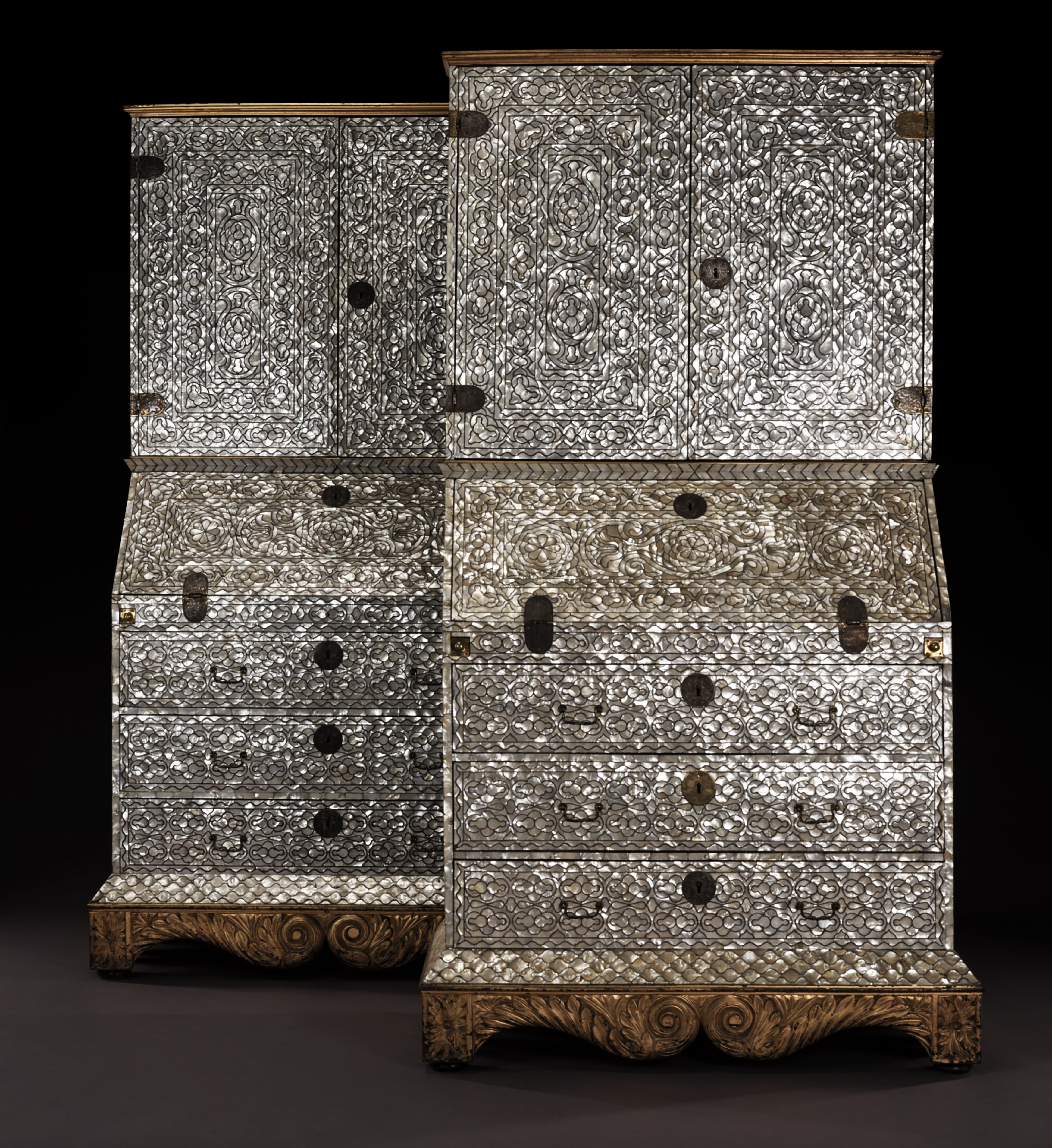 A magnificent pair of Spanish-colonial Viceregal Peruvian mother-of-pearl inlaid bureau-cabinets