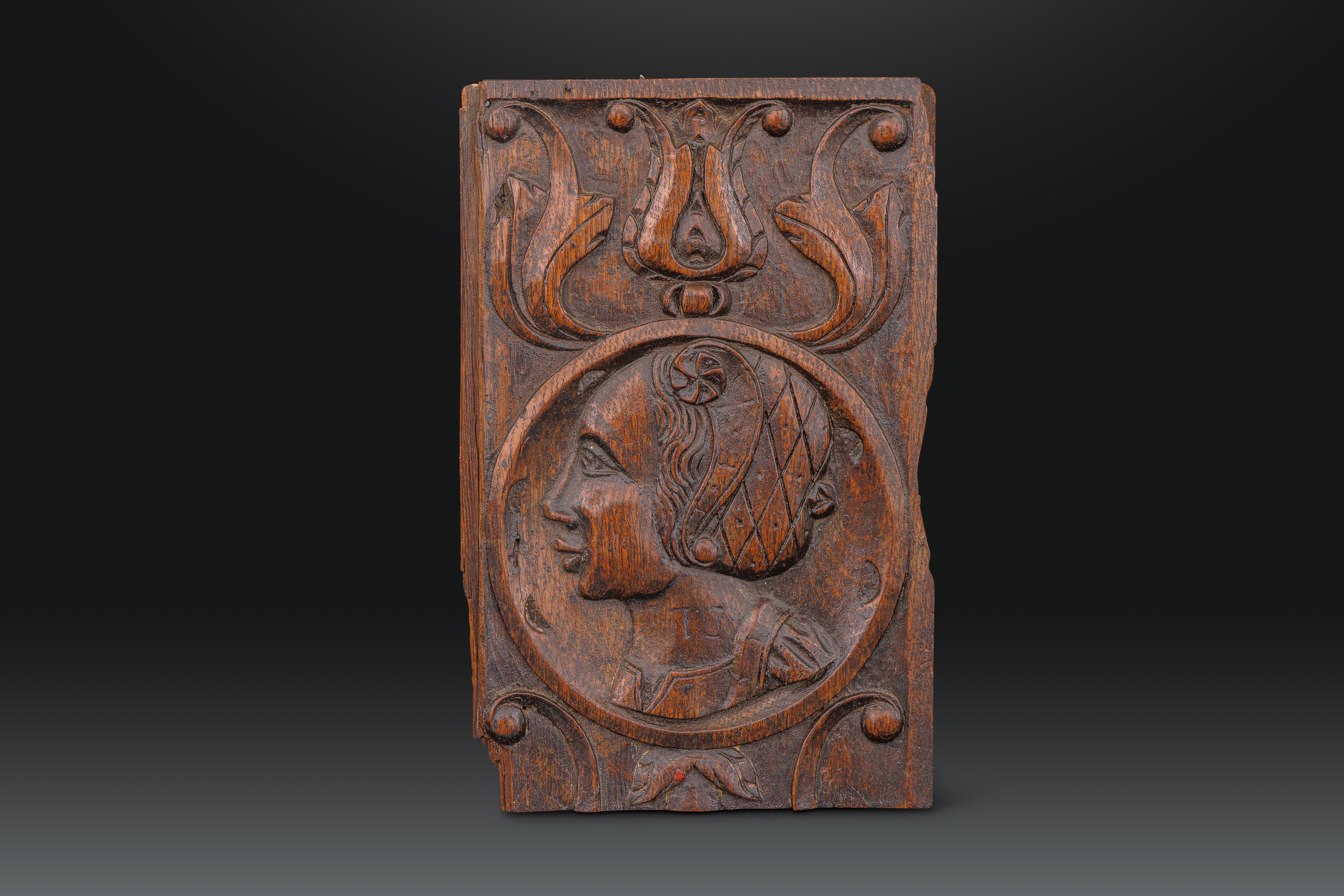 A Fine English Henry VIII Period Carved Panel Depicting a Female Bust Portrait (the Lady Depicted Wearing a Coif or Headscarf and Initialled IC or TC)