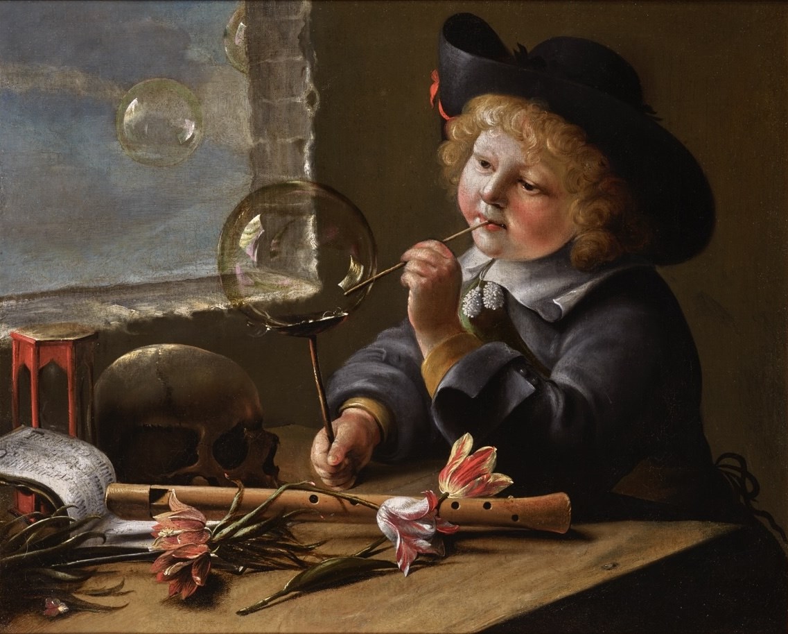 A Young Boy Blowing Bubbles