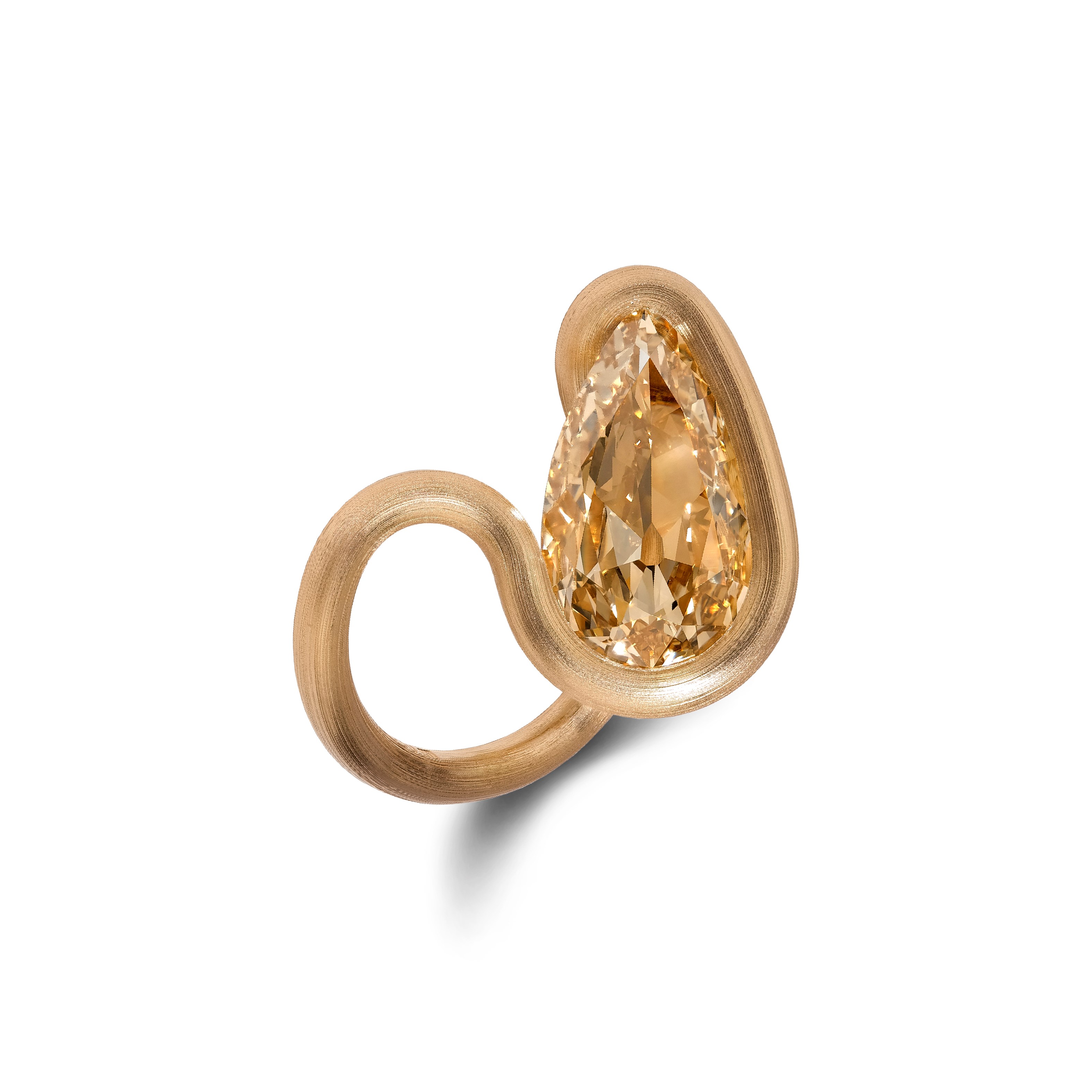 A 5.54 carat pear-shaped diamond and yellow gold ring